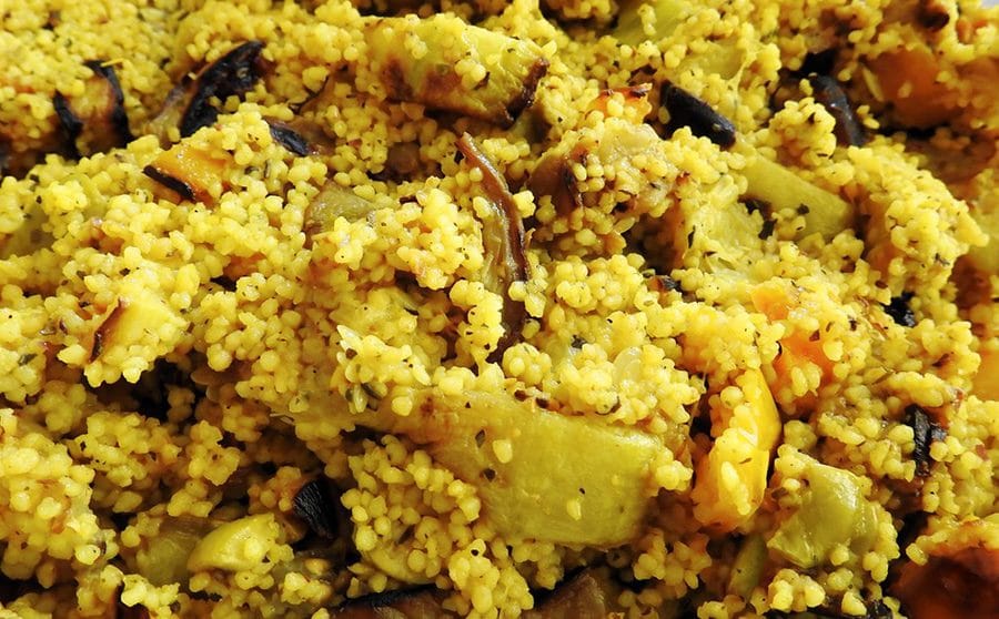 Moroccan spiced cous-cous with mint, lemon juice and capsicum.